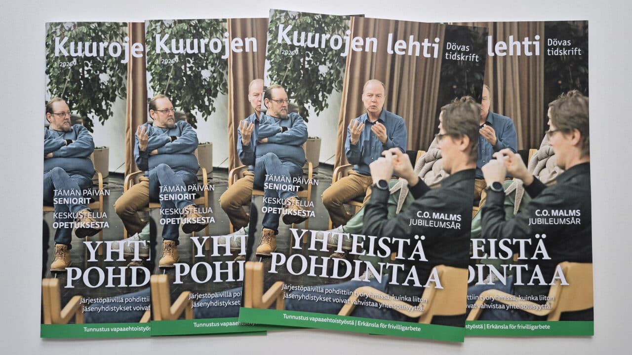 Kuurojen lehden numeron 1/2026 kansia, joissa näkyy viittovia ihmisiä