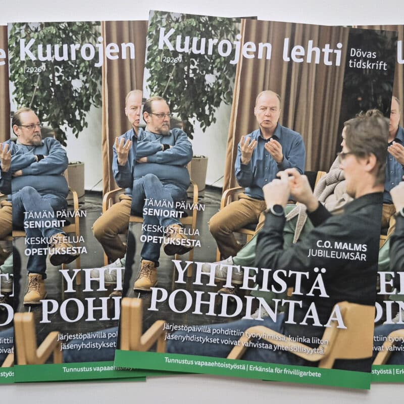Kuurojen lehden numeron 1/2026 kansia, joissa näkyy viittovia ihmisiä